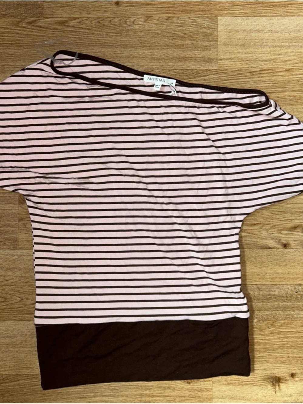 Pink and brown striped off the 
Shoulder top